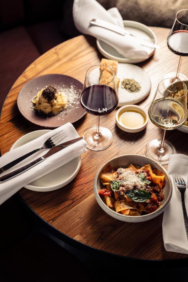 Next Hotel Melbourne, Curio Collection By Hilton Εξωτερικό φωτογραφία A selection of dishes at the restaurant