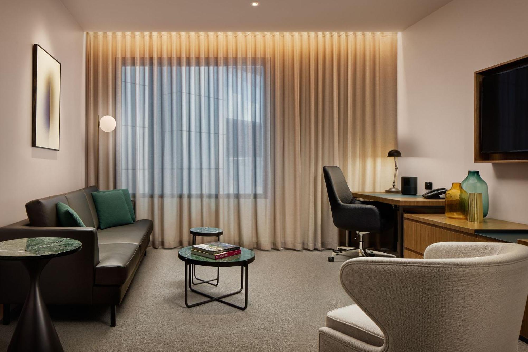 Next Hotel Melbourne, Curio Collection By Hilton Εξωτερικό φωτογραφία A living room at the hotel